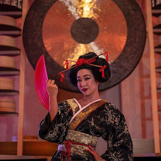 Geisha - Eatrenalin Late Night An elegant geisha in a traditional Chinese dress.